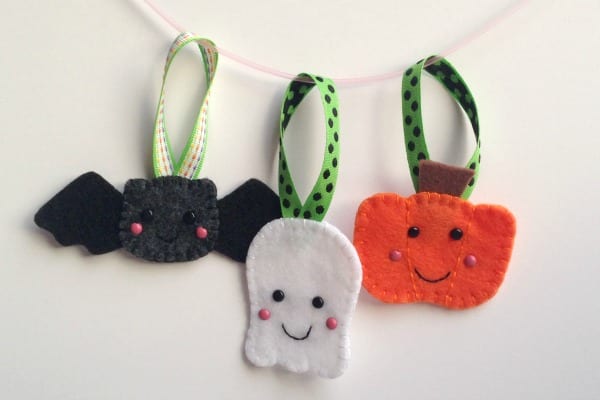 Halloween traditions include making felt ornaments to decorate the house. 