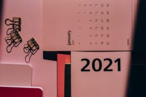 Modern agenda with monthly calendar near clips