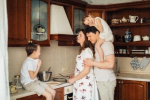 Family preparing crepes together