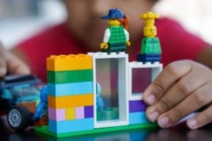 Kid Playing with lego