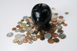 Silver coins on white surface