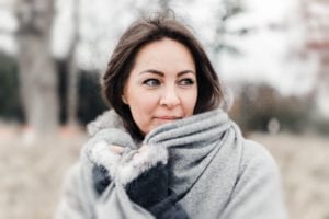 Woman wearing grey top