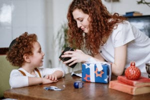 Mother and son with a gift