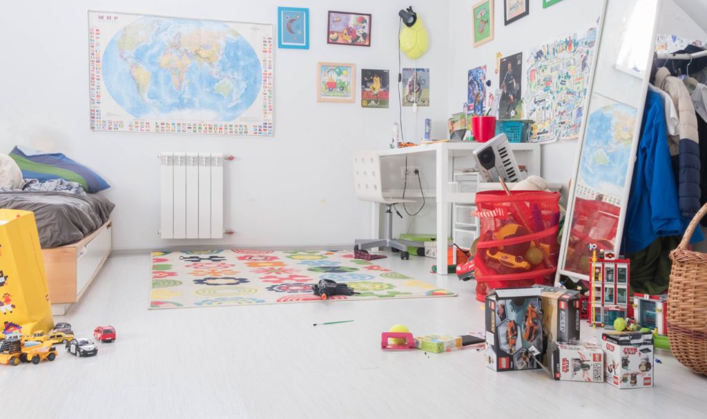 A messy and overcrowded kids' room