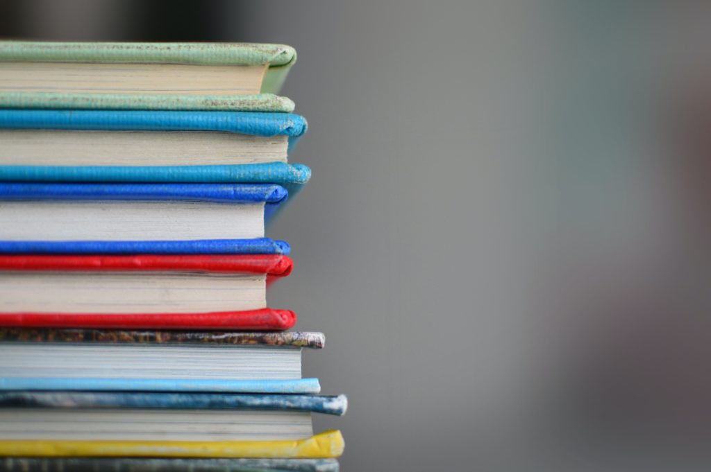 A stack of brightly colored books 